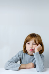 Portrait of a girl who is bored