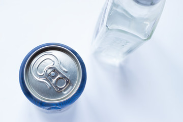 Open empty can top view with water drop close up isolated on white with clipping path