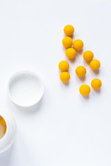 Round Pills in a Bottle/Close up of Pills