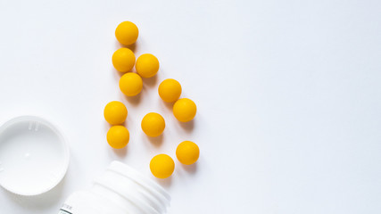 Round Pills in a Bottle/Close up of Pills