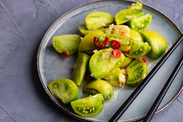 Spicy green tomato salad