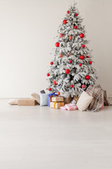 Christmas tree in the white room gifts new year