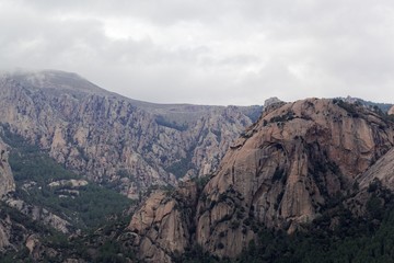 Mountains with clouds in the Bavella region in Southern Corsica.