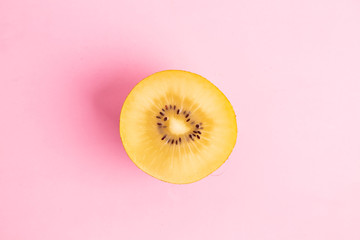 yellow kiwi on colorful background