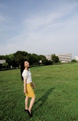 Fototapeta premium Asian female model poses for pictures in the nature