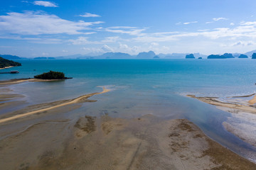 Aerial drone view of low tide on a beautiful tropical island and ocean
