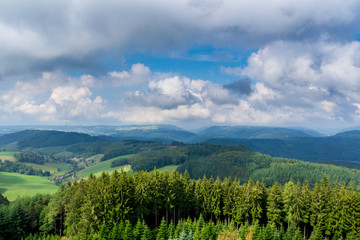 Fototapeta premium Germany, Endless view over fir tree tops of black forest mountains and valleys on huenersedel mountain