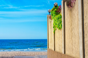 image of sea shore and wall on the beach 