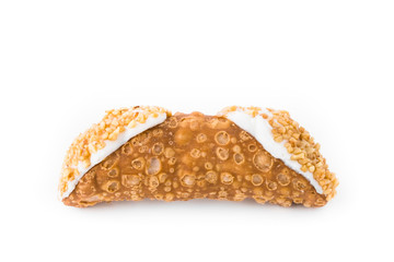 Sicilian cannolo with ricotta and hazelnut grains