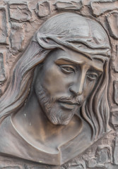 Fototapeta na wymiar Bronze Bas-relief of Christ