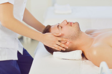 Fototapeta na wymiar Facial massage for man. 