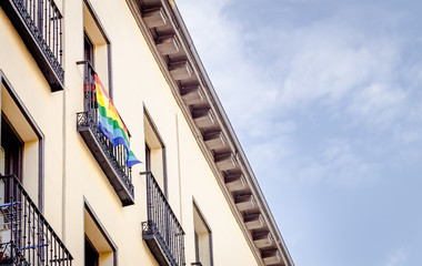 Fototapeta na wymiar LGBT Flag on Madrid Balcony