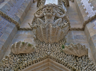 Fototapeta premium Castle entrance protected by an ancient Gargoyle