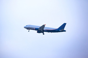 takeoff of a passenger liner against a blue sky