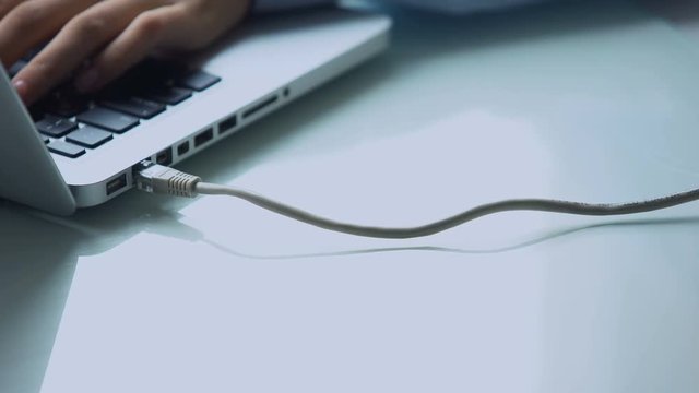 Hand connecting high speed internet laptop, modern personal computer technology