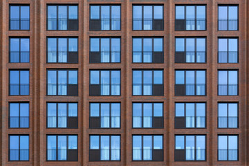 Fototapeta na wymiar Modern architecture detail windows and wall of skycraper