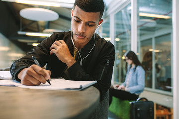 Student preparing for exams at university library
