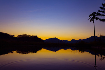 Beautiful reflection with vibrant colors in the lake, Laos