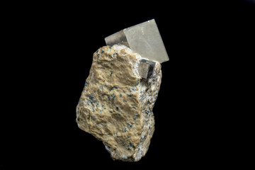 Macro Pyrite mineral stone on black background