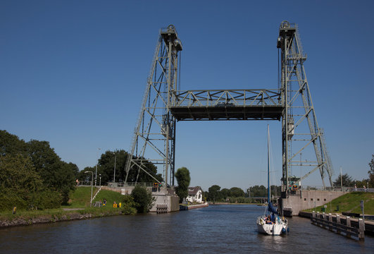 Steel vertical lift bridge in Alphen aan den Rijn over the canal Gouwe