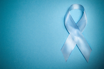 Blue ribbon symbol of prostate cancer.