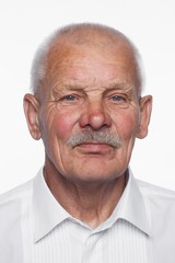 Obraz premium Portrait of old man, posing in studio on white background