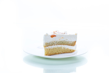 a piece of homemade sweet cake with cream and canned apricots