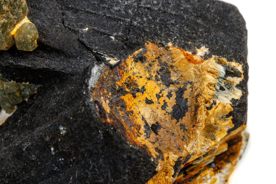 Macro mineral stone Quartz Hedenbergite Prase on ilvite on a white background