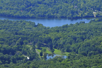Naklejka na ściany i meble aerial view of mountains with lake