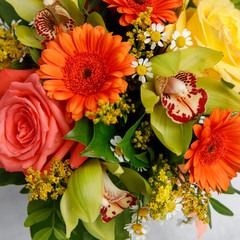 Mix bouquet of daisies, lilies, roses and exotic