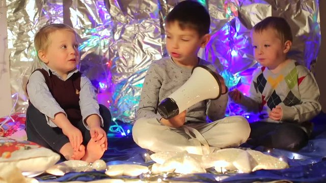 Home education. Adaptation of life to the conditions of the virus COVID 19. Remote education. Three kids celebrate new year.