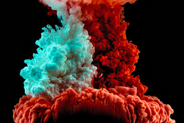 abstract formed by color dissolving in water on black background