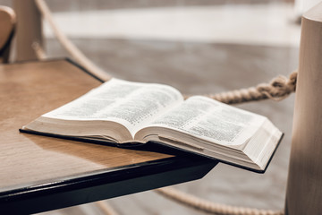 Book is on the table in the library
