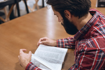 Modern man reads a book