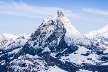 Fototapeta na wymiar Matterhorn peak in Swiss Alps, snow