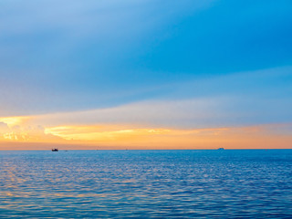 Seascape view under twilight evening sky