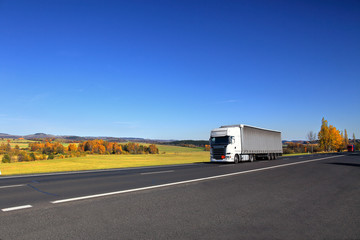 Fototapeta na wymiar Truck transport on the road