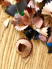 Colored pencils and variegated chips.
Colored wooden pencils and shavings.