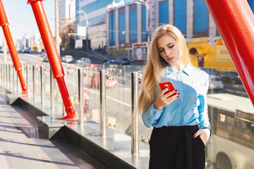 Modern young woman in a big city