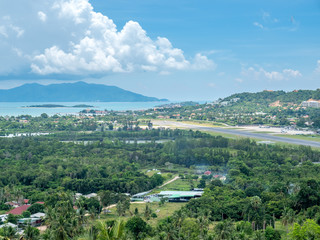 Fototapeta premium Samui airport under cloudy blue sky, Thailand