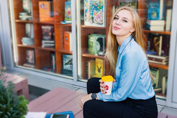 Modern young woman in a big city