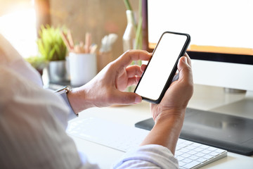 Man working on mobile phone. Blank screen smart phone for graphic montage