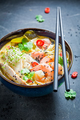 Closeup of malaysian Soup with prawn and coconut milk