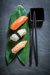 Top view of Nigiri sushi with octopus, prawn and salmon
