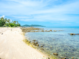 Seascape view under cloudy blue sky