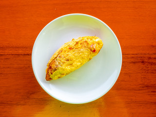 Omelette egg on dish