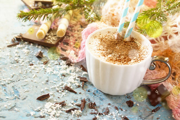 Coffee with whipped cream, a cup of cappuccino. Christmas frame. Copy space.