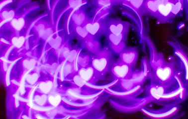 Hearts shape Christmas light bokeh background.