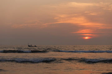 fishing boat at sunset