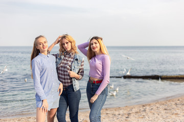 A picture of a group of women having fun on the beach